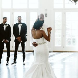 Selling my once worn custom wedding gown.